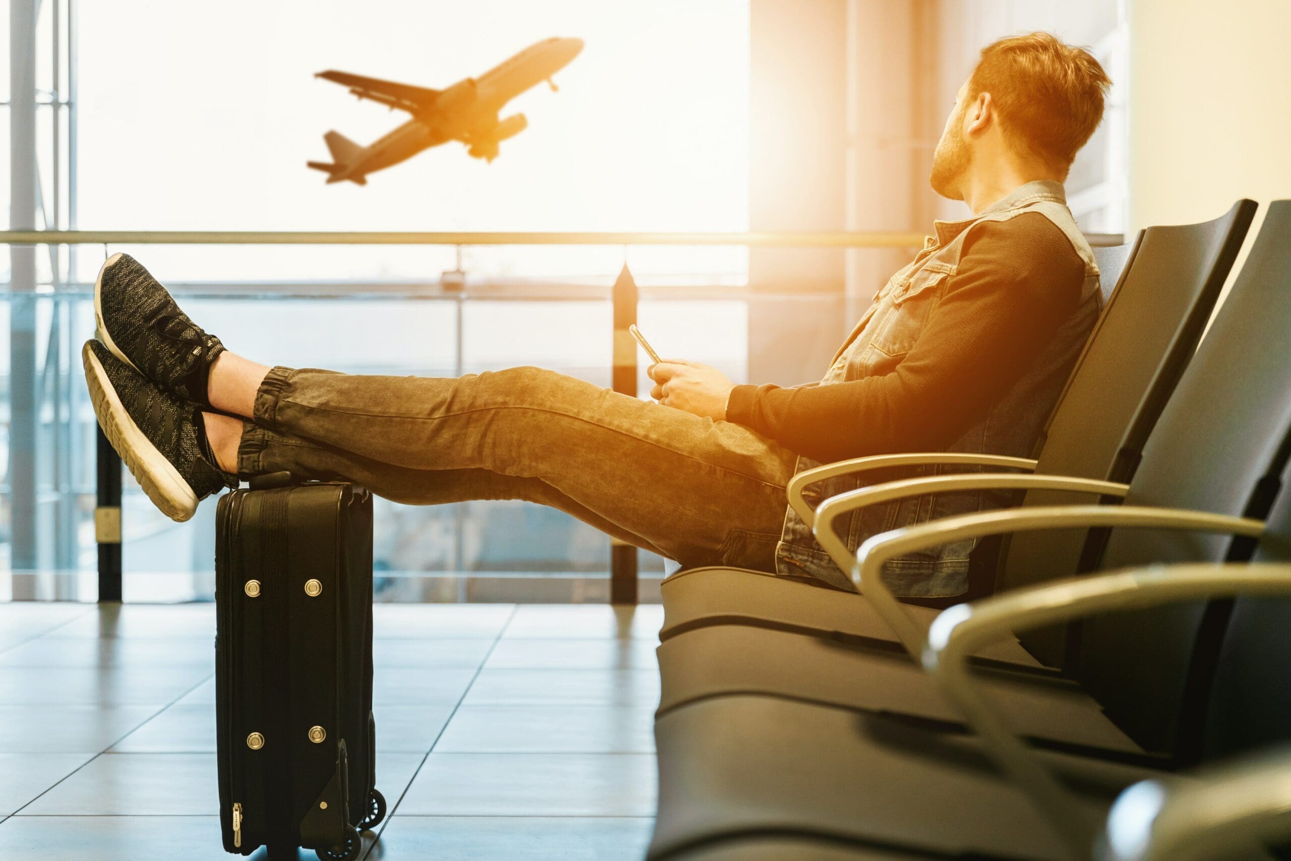 person in chair at airport